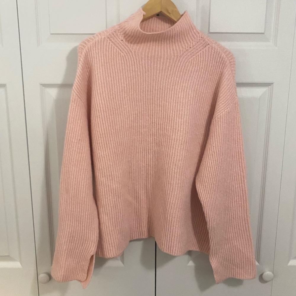 Cozy Pink Ribbed Turtleneck Sweater